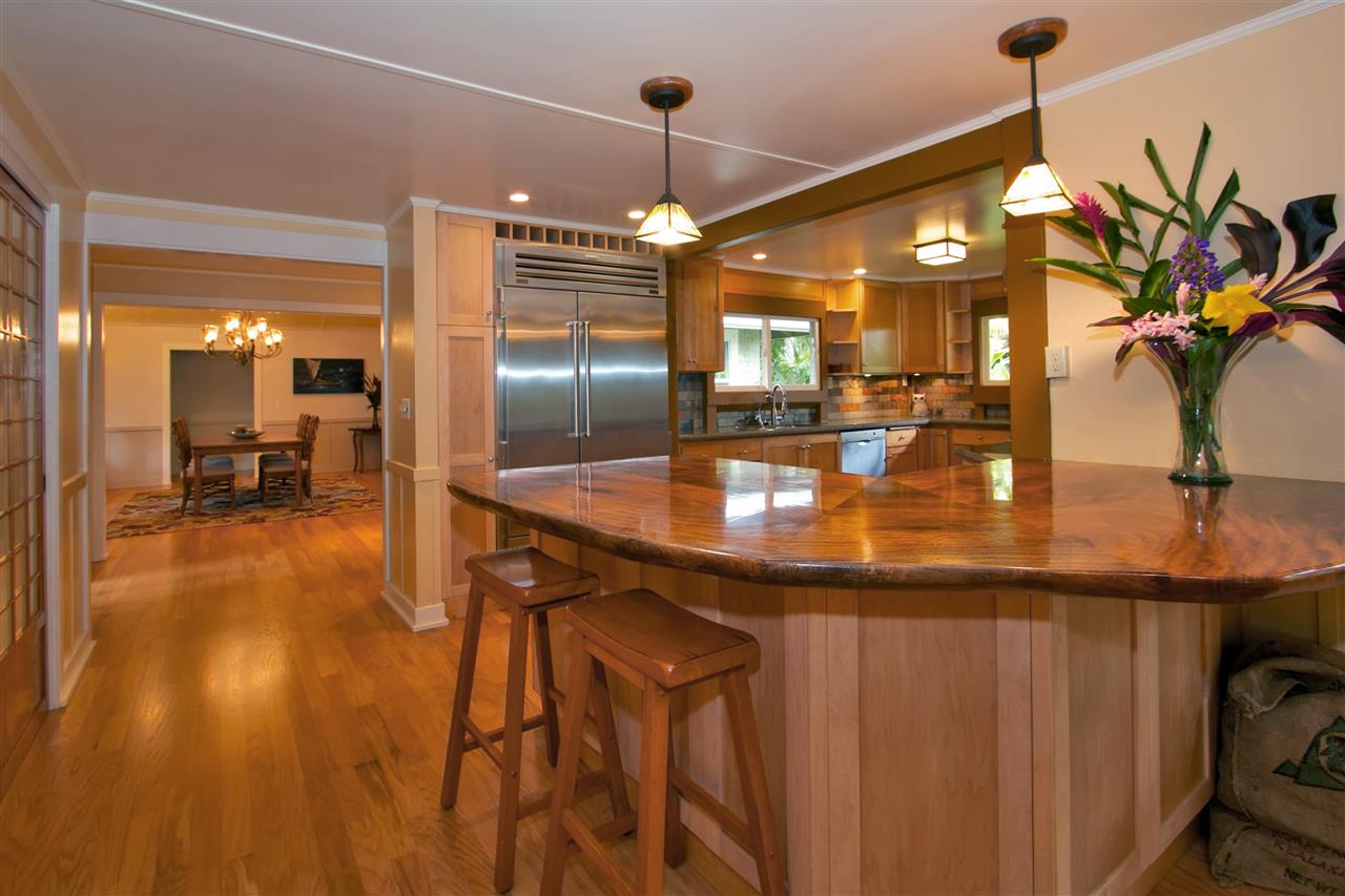 261 Awalau Road Haiku, HI 96708 - Photo 2 of 29 a kitchen with sink and view of living room