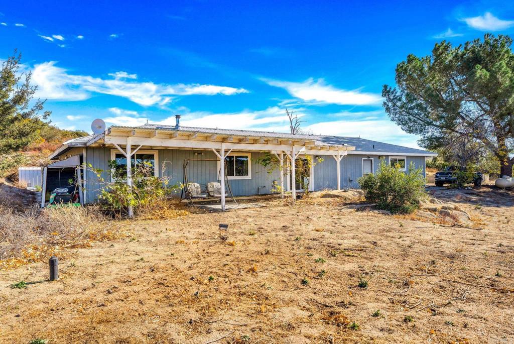 961 Forest Gate Road Campo, CA 91906 - Photo 1 of 1 a view of a house with a yard