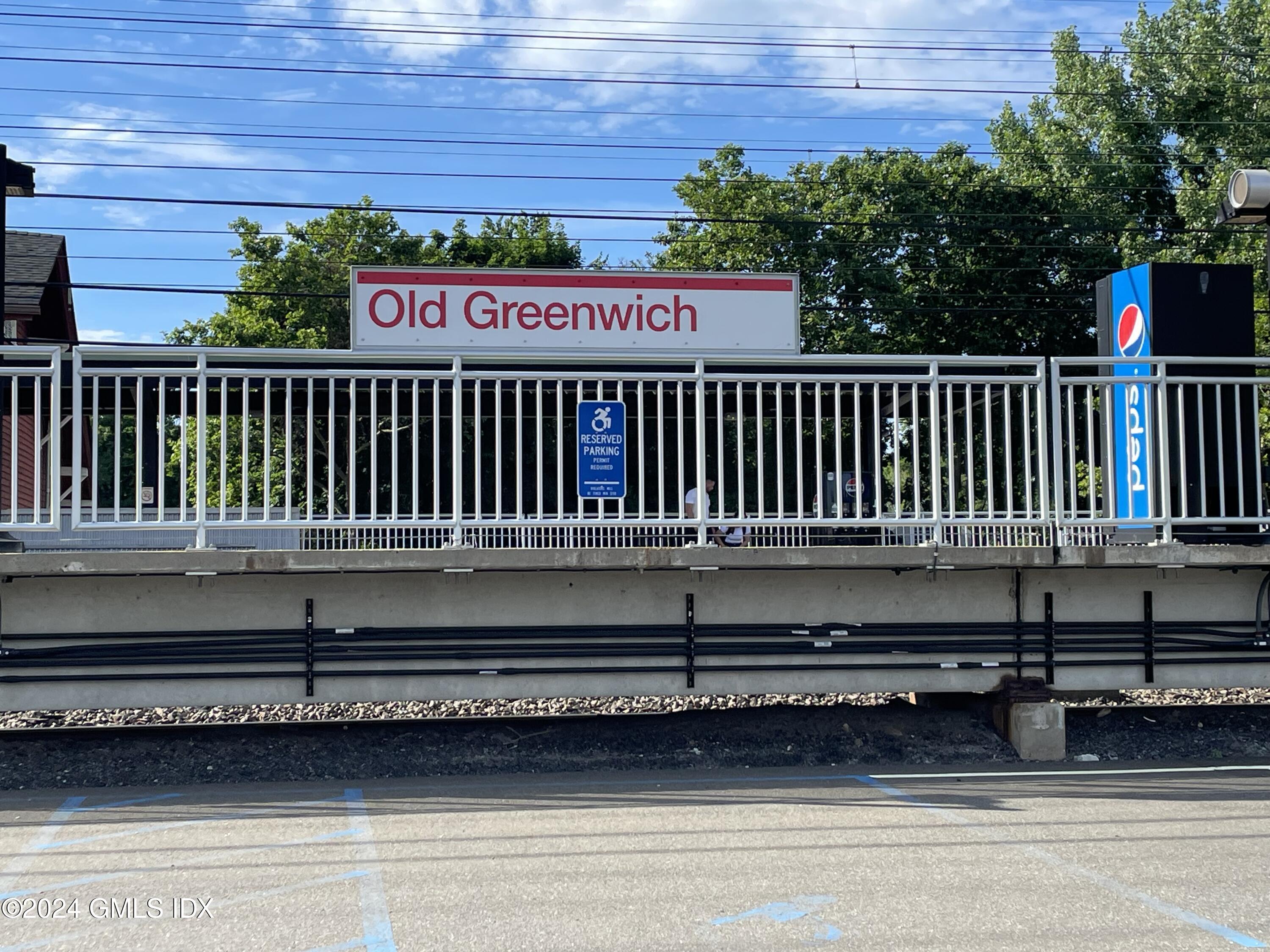 8 Sound Beach Ave Extension, Unit 1 Riverside, CT 06878 - Photo 24 of 31 a view of a wooden bench