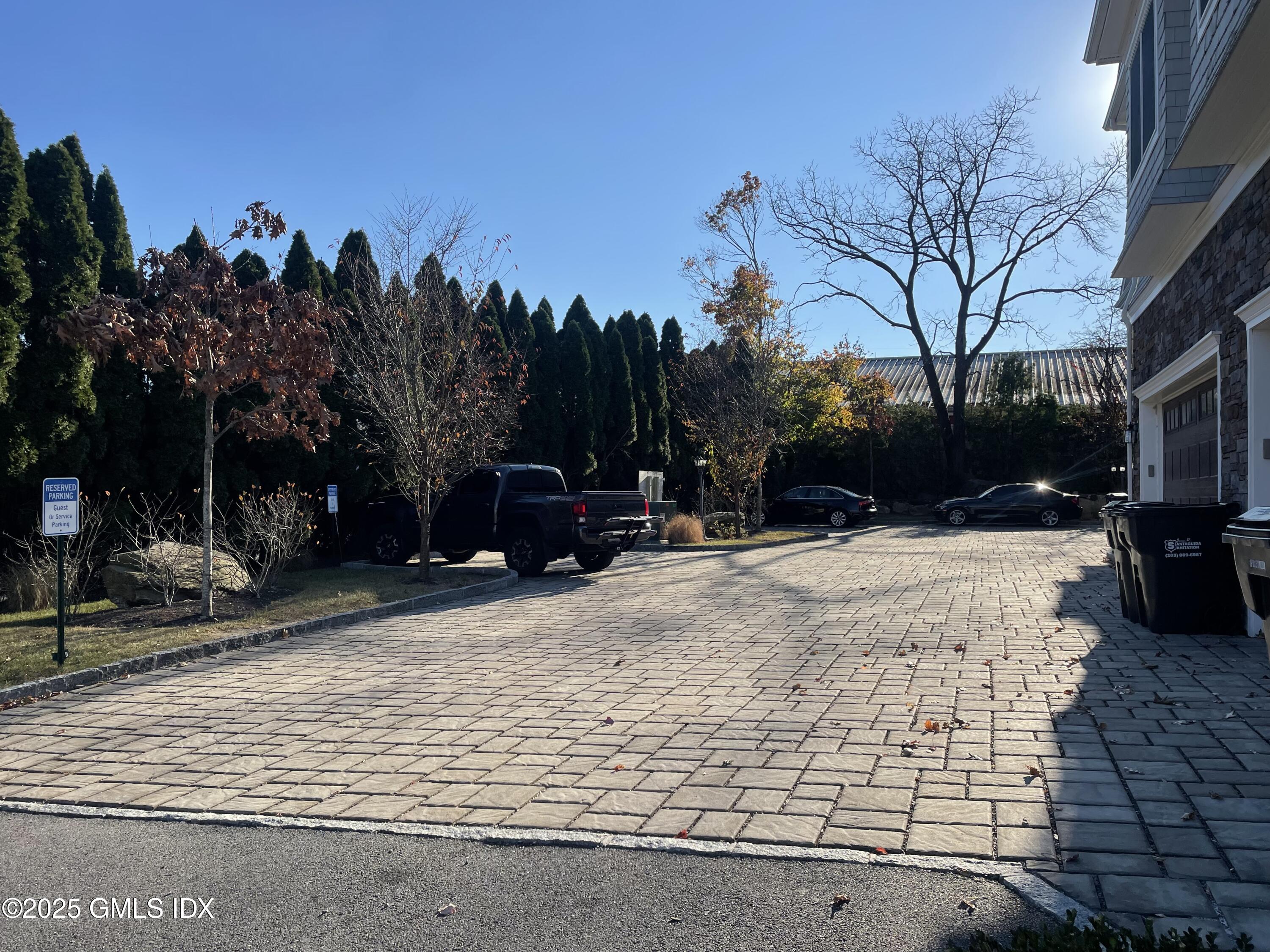 8 Sound Beach Ave Extension, Unit 1 Riverside, CT 06878 - Photo 4 of 31 a view of road with trees