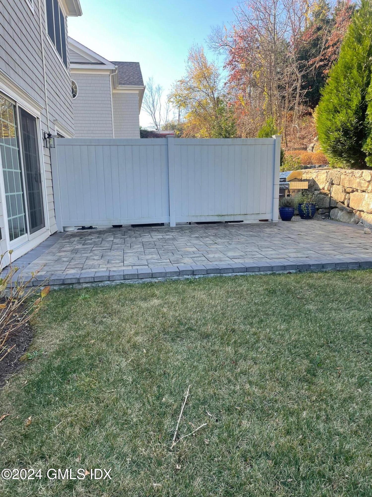 8 Sound Beach Ave Extension, Unit 1 Riverside, CT 06878 - Photo 9 of 31 a view of back yard of the house
