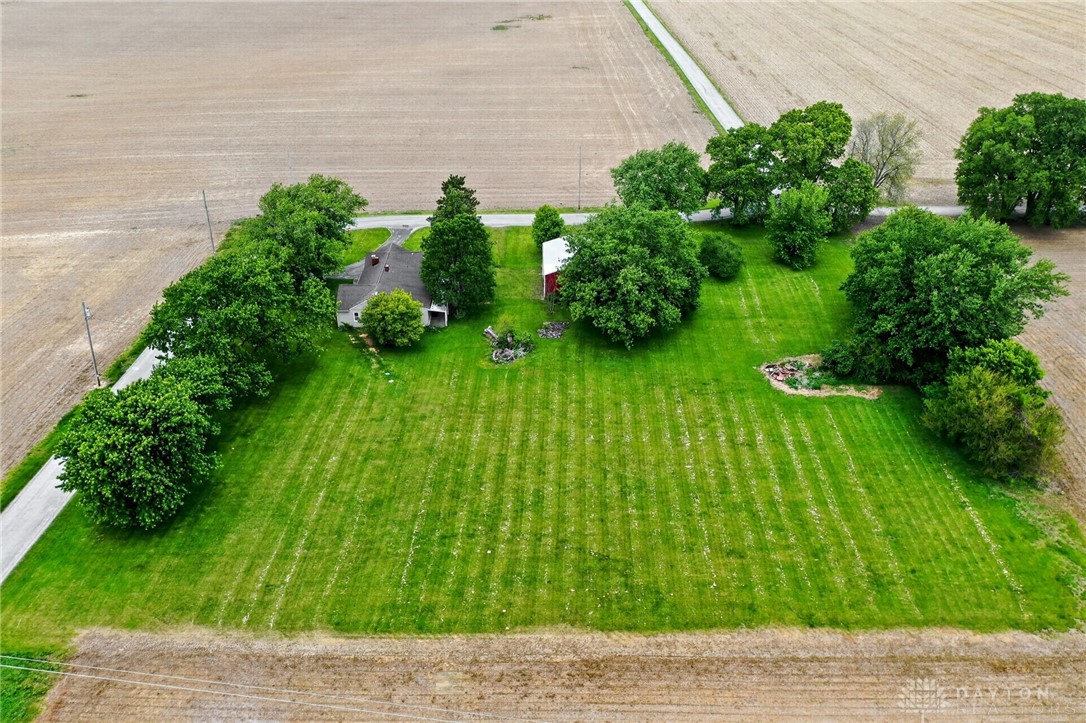 2470 Clark Run Road Xenia, OH 45385 - Photo 4 of 57 Expansive green grounds surround this charming property, offering a serene rural escape.