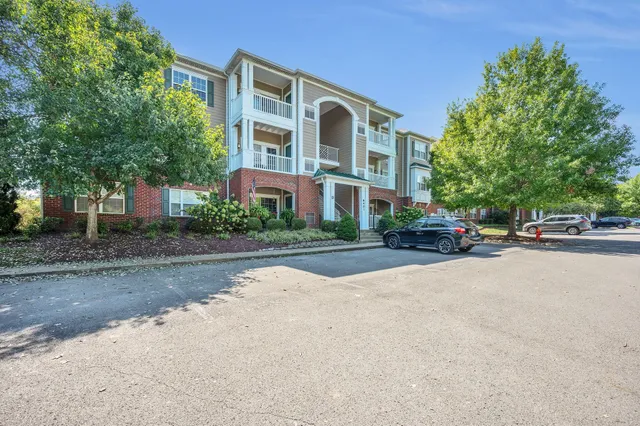 a building with trees in front of it