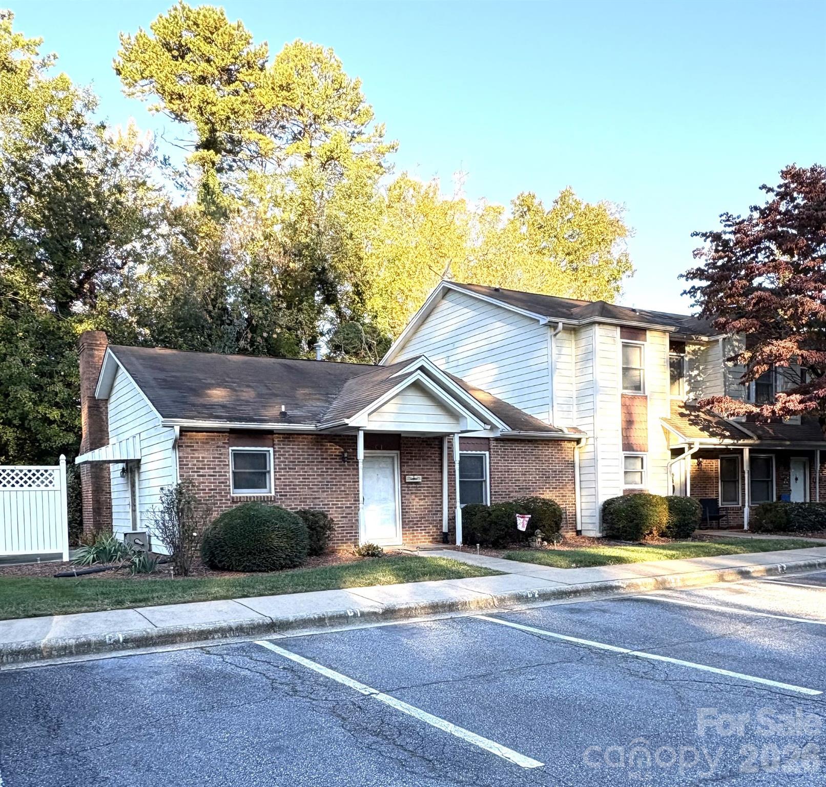 605 8th Avenue Southwest, Unit C1 Conover, NC 28613 - Photo 2 of 14 a front view of a house with a garden