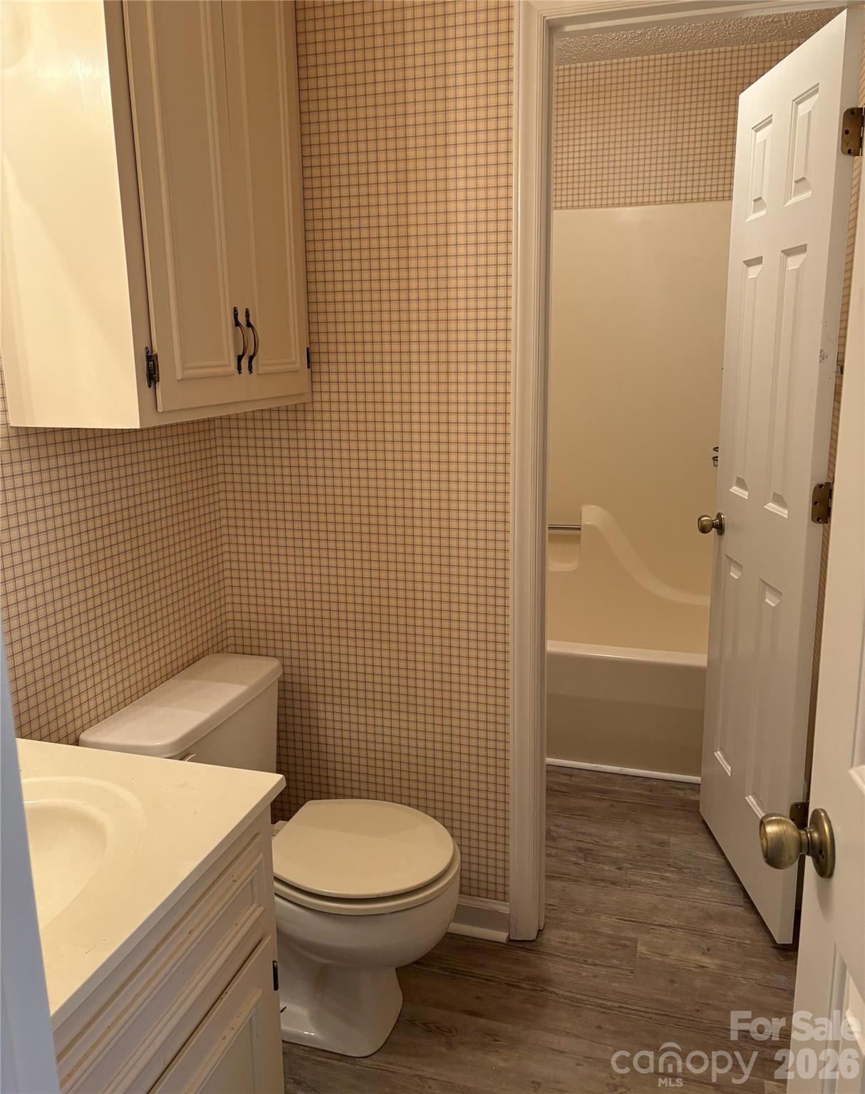 605 8th Avenue Southwest, Unit C1 Conover, NC 28613 - Photo 10 of 14 a bathroom with a toilet and shower