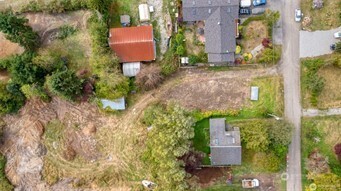 1361 Peltier Drive Point Roberts, WA 98281 - Photo 11 of 11 a backyard of a house with a yard and outdoor seating