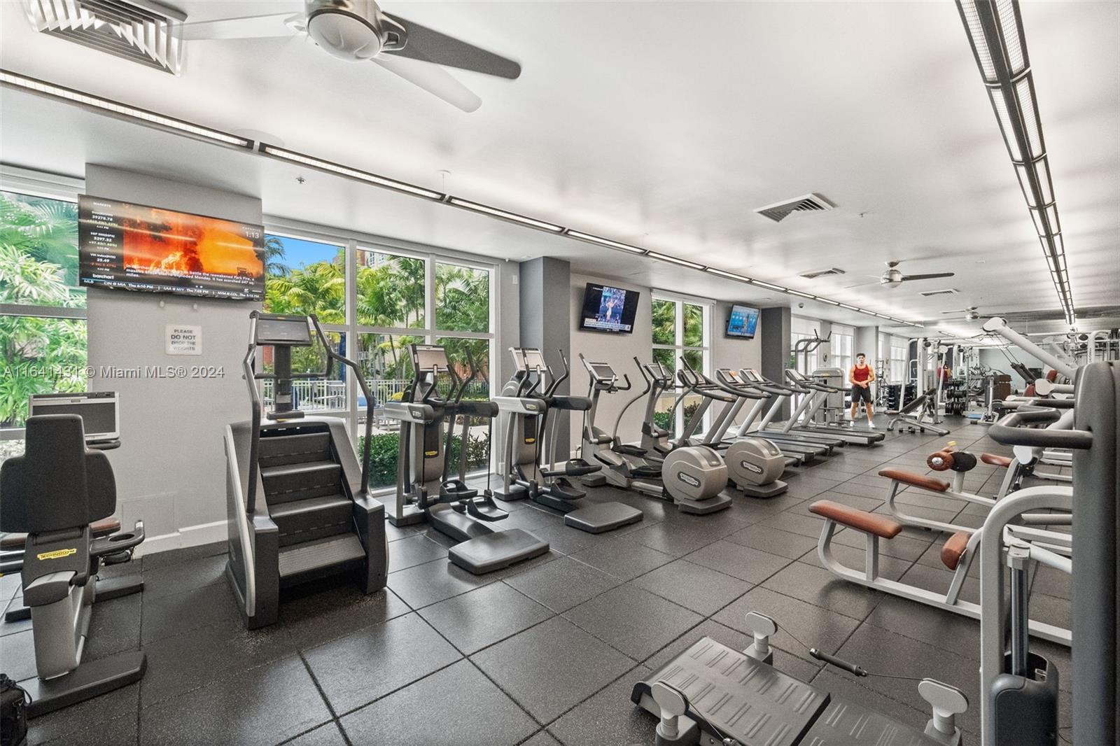2001 Biscayne Boulevard, Unit 2409 Miami, FL 33137 - Photo 25 of 29 a view of a room with gym equipment