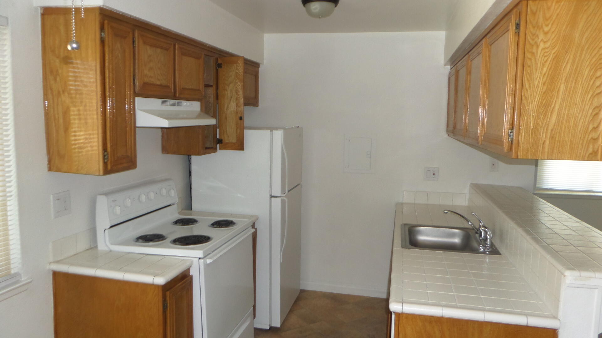 72631 Thrush Road, Unit 4 Palm Desert, CA 92260 - Photo 3 of 24 a utility room with sink dryer and washer
