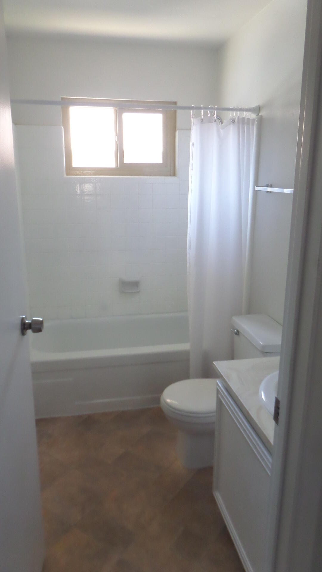 72631 Thrush Road, Unit 4 Palm Desert, CA 92260 - Photo 10 of 24 a bathroom with a sink a toilet and shower