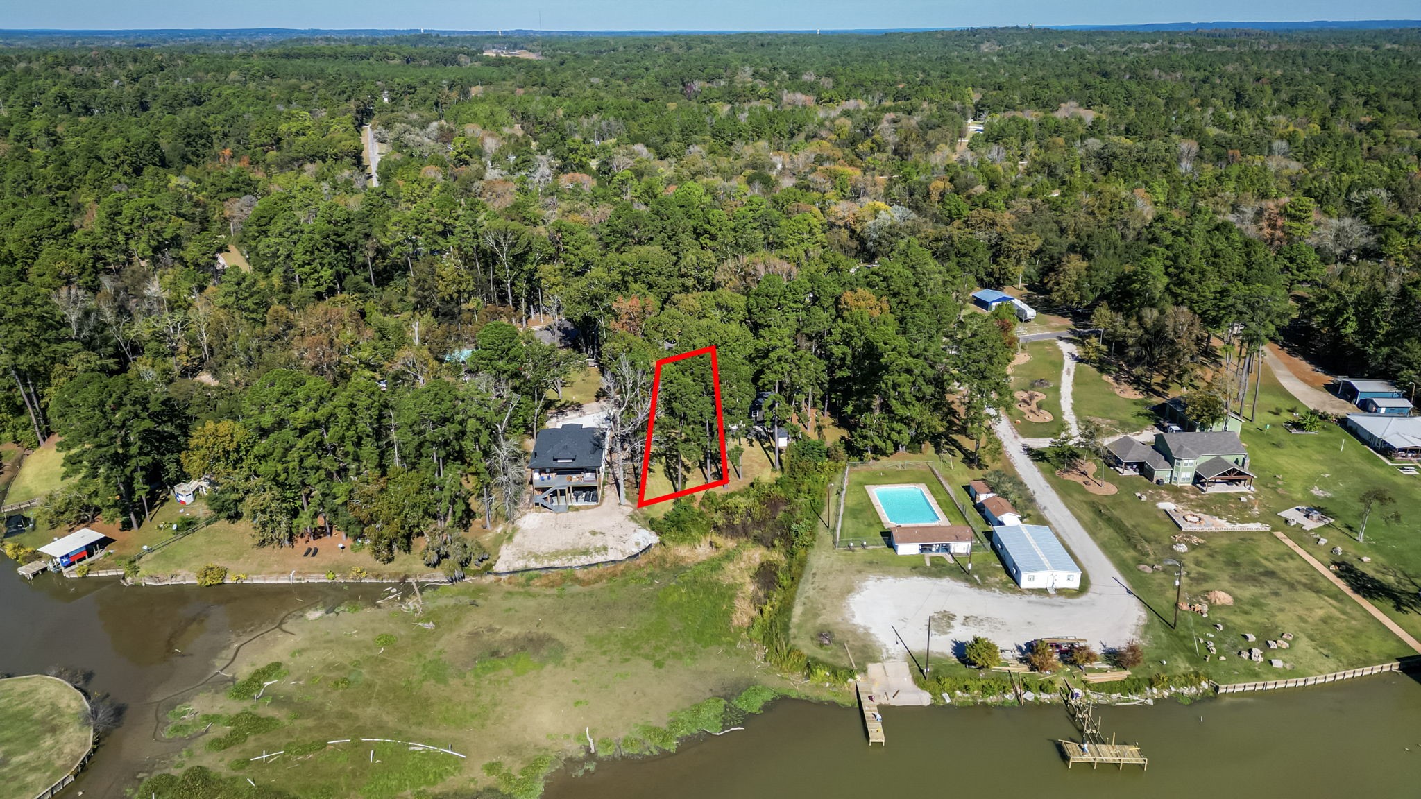 0 Hackberry Street Trinity, TX 75862 - Photo 2 of 7 an aerial view of residential houses with outdoor space and trees