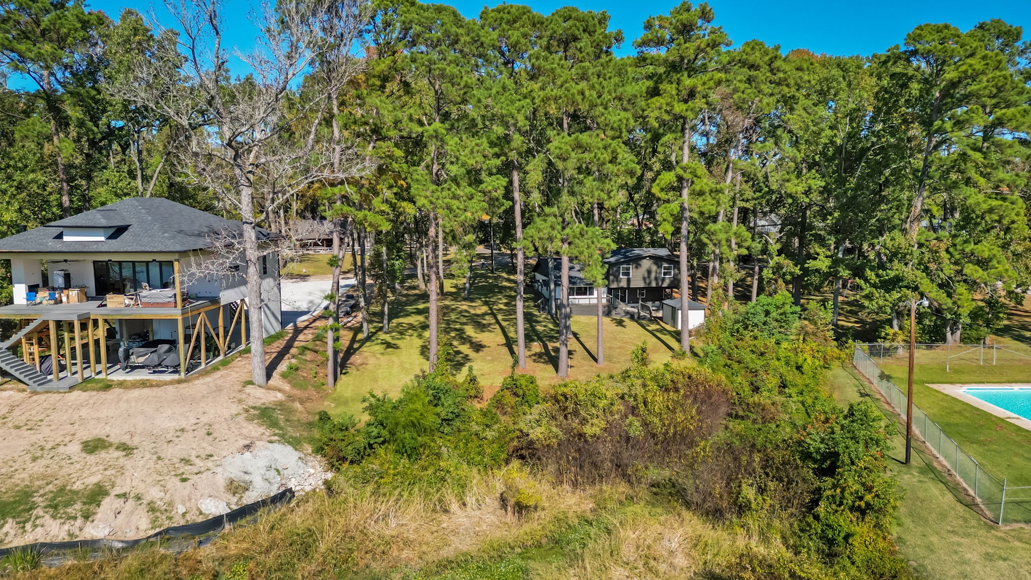 0 Hackberry Street Trinity, TX 75862 - Photo 3 of 7 a view of swimming pool with lawn chairs and plants