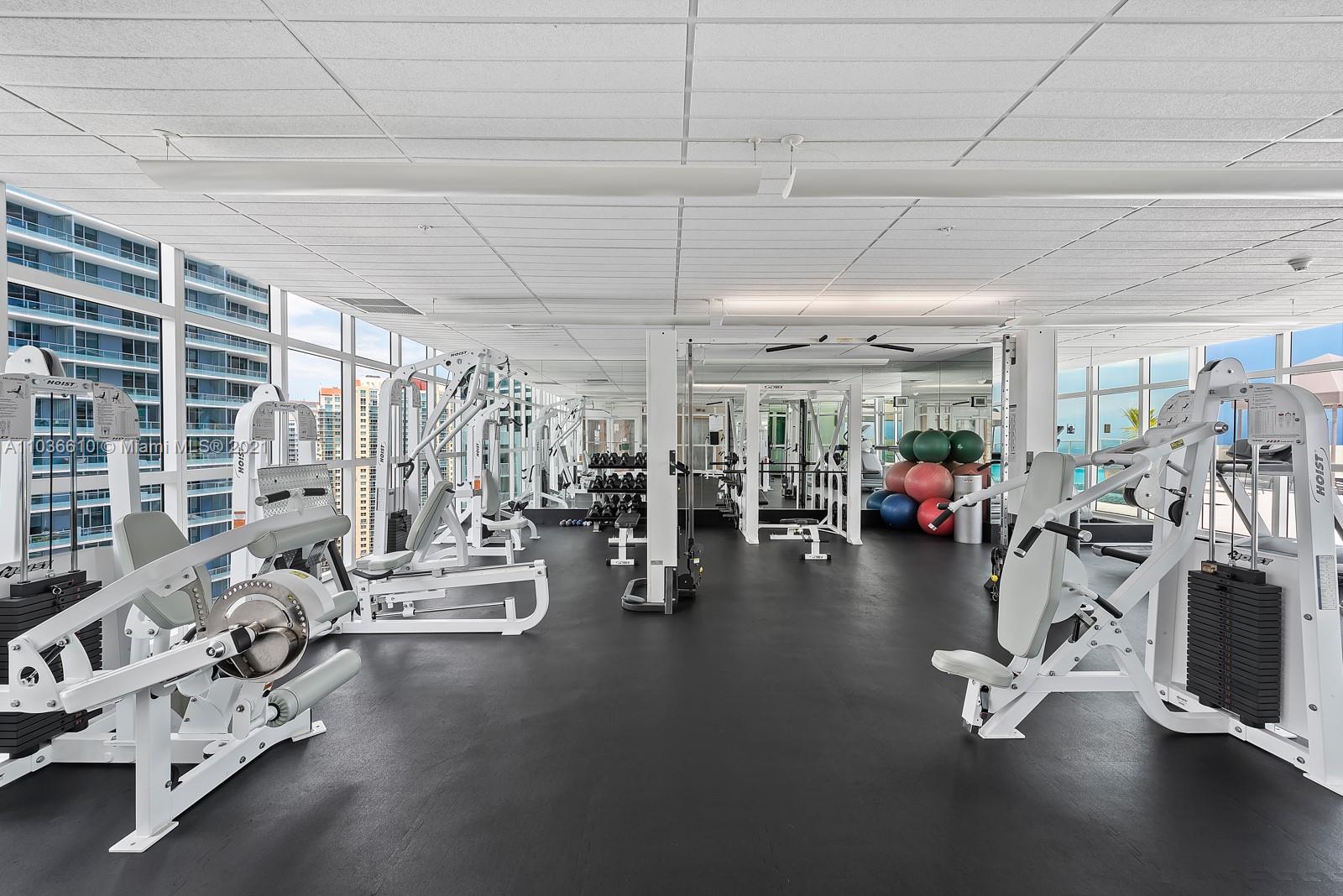 218 Southeast 14th Street, Unit TS103 Miami, FL 33131 - Photo 20 of 31 a view of a room with gym equipment