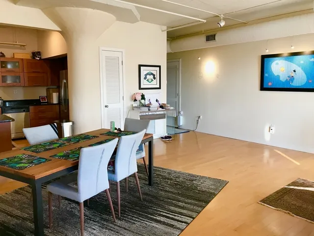 a view of a dining room with furniture