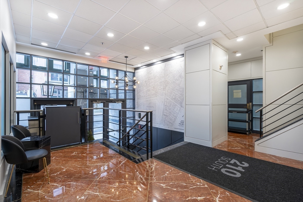 210 South Street, Unit 104 Boston, MA 02111 - Photo 21 of 24 a view of a hallway with seating area