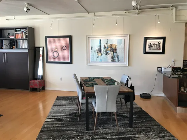 a view of a dining room with furniture