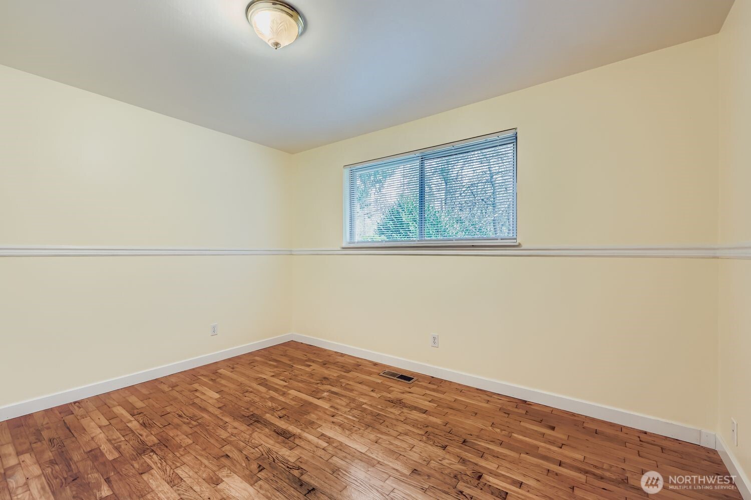 5031 158th Street Southwest Edmonds, WA 98026 - Photo 12 of 17 a view of empty room with wooden floor