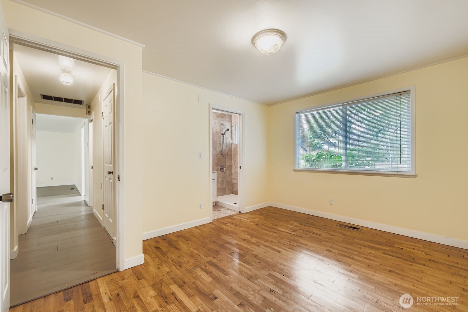 5031 158th Street Southwest Edmonds, WA 98026 - Photo 10 of 17 wooden floor in an empty room