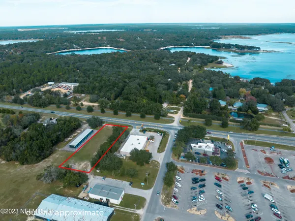 a view of a lake with a yard