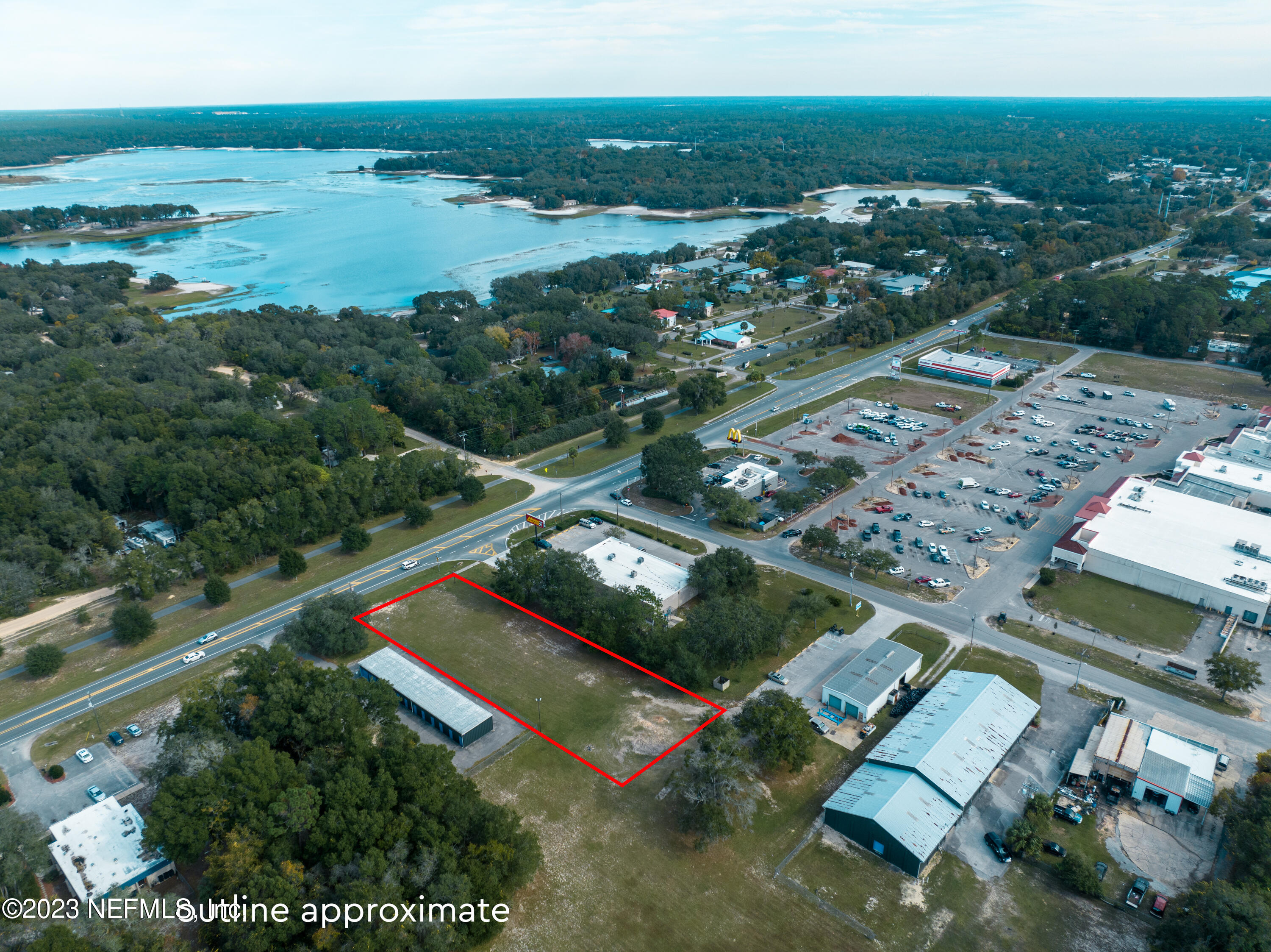 0 State Road 100 Keystone Heights, FL 32656 - Photo 7 of 15 an aerial view of residential houses with outdoor space and river