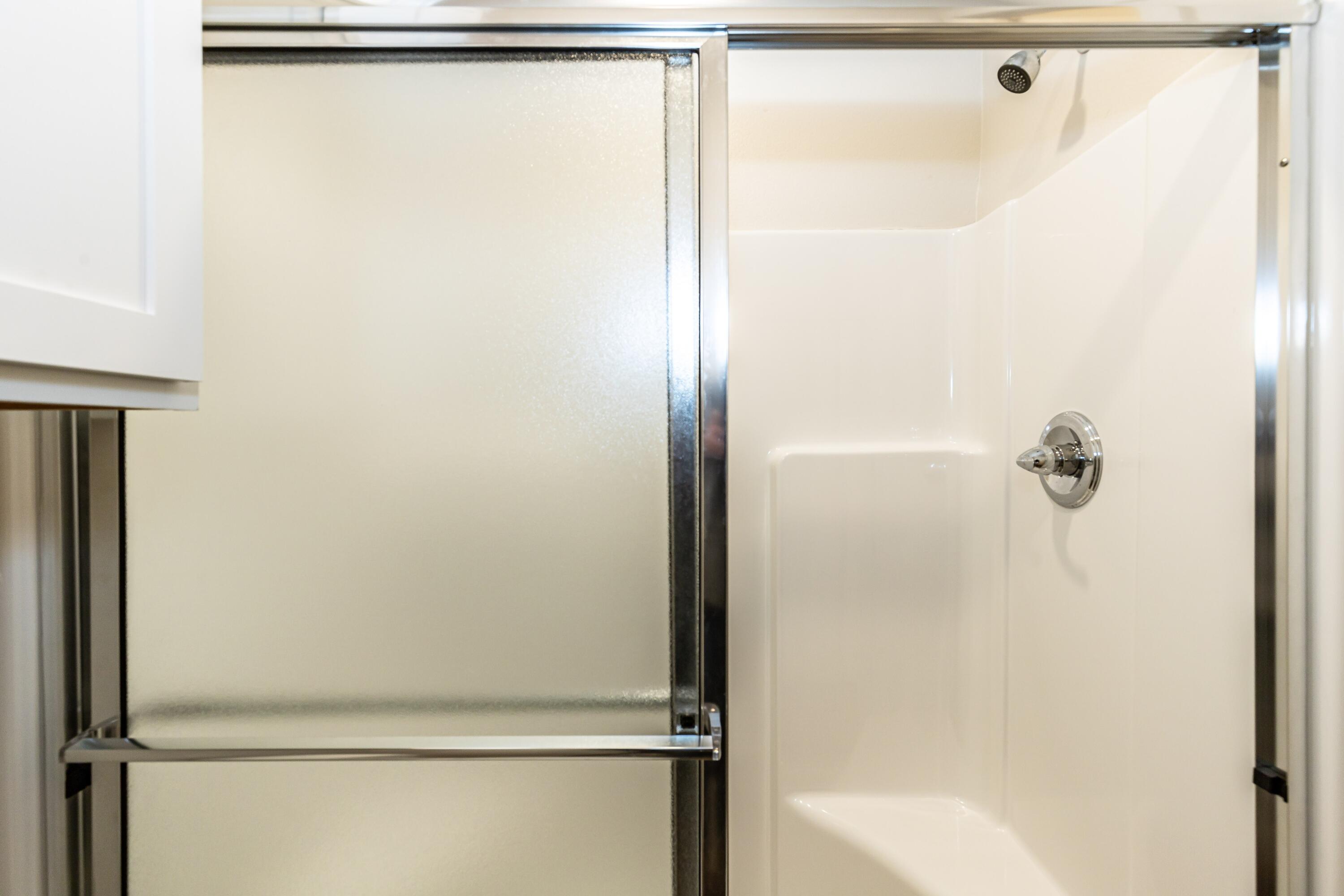 2529 138th Street Lubbock, TX 79423 - Photo 21 of 24 a bathroom with a shower