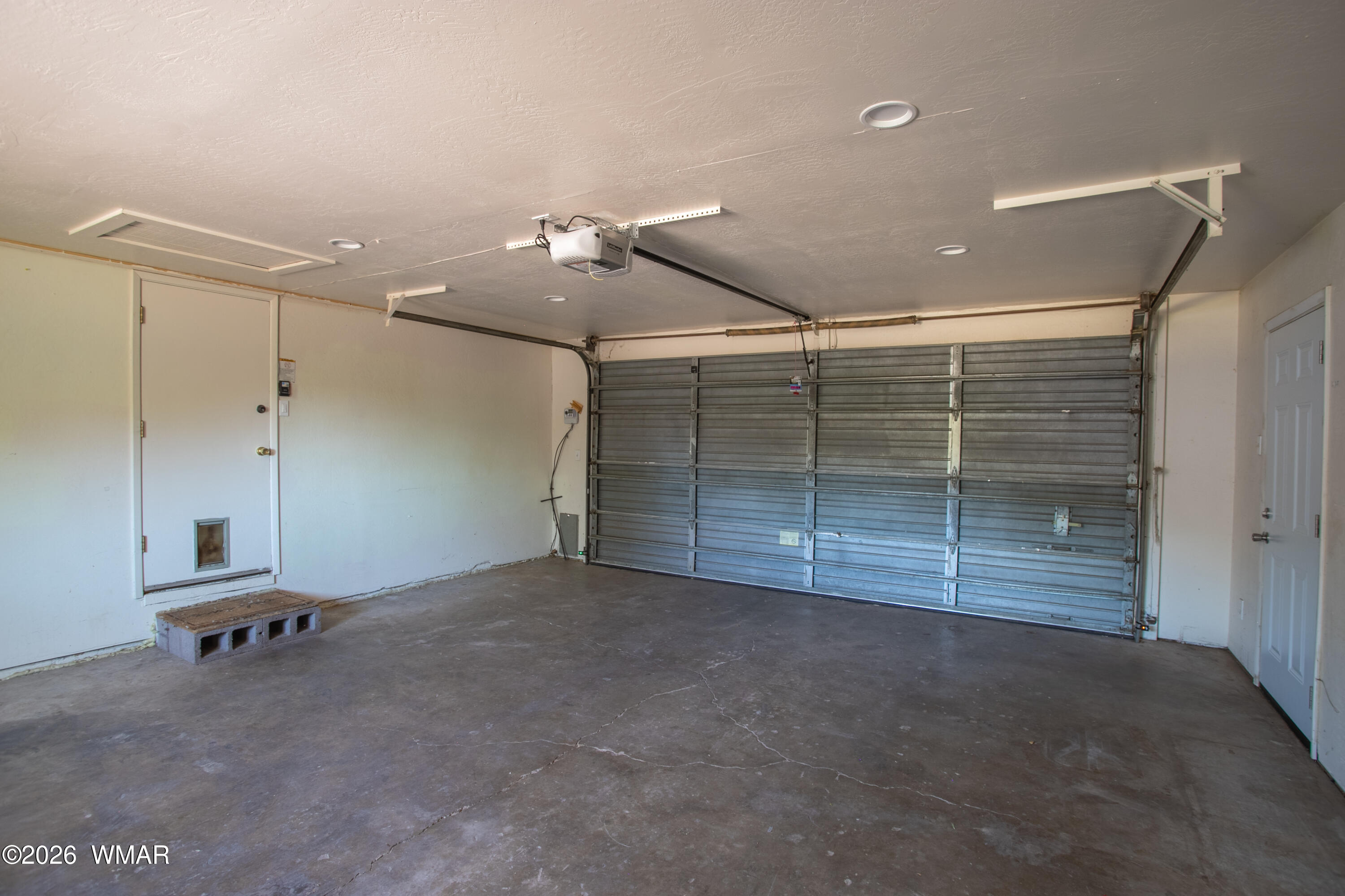 411 West Stratton Show Low, AZ 85901 - Photo 28 of 47 a view of a room with gym equipment and a window