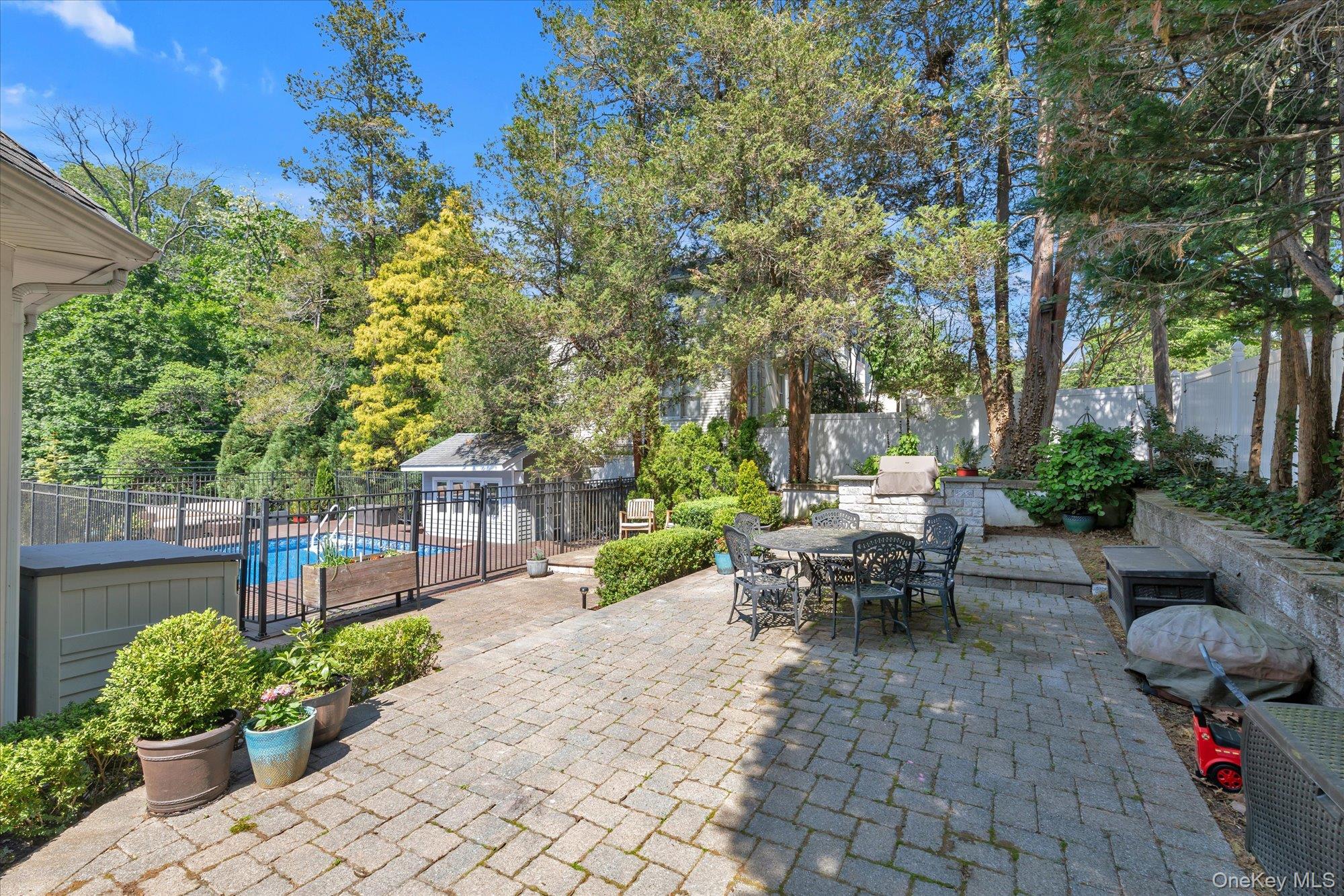 80 Skunks Misery Road Locust Valley, NY 11560 - Photo 22 of 25 a garden view with a seating space