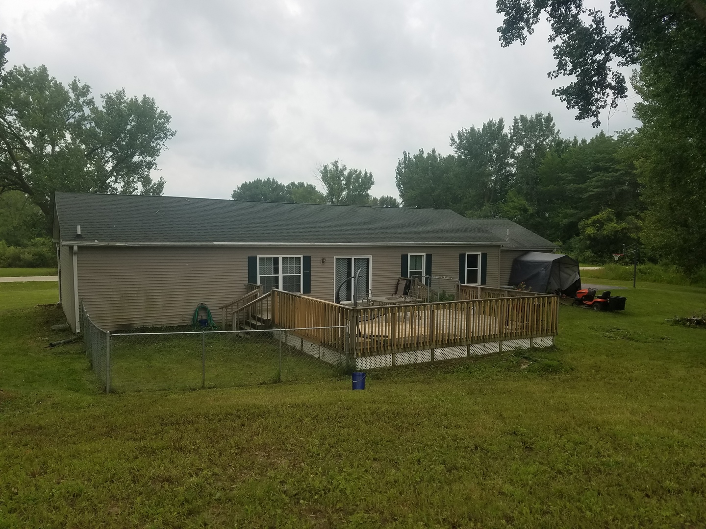 25814 Mary Road Garden Prairie, IL 61038 - Photo 16 of 19 a front view of a house with garden