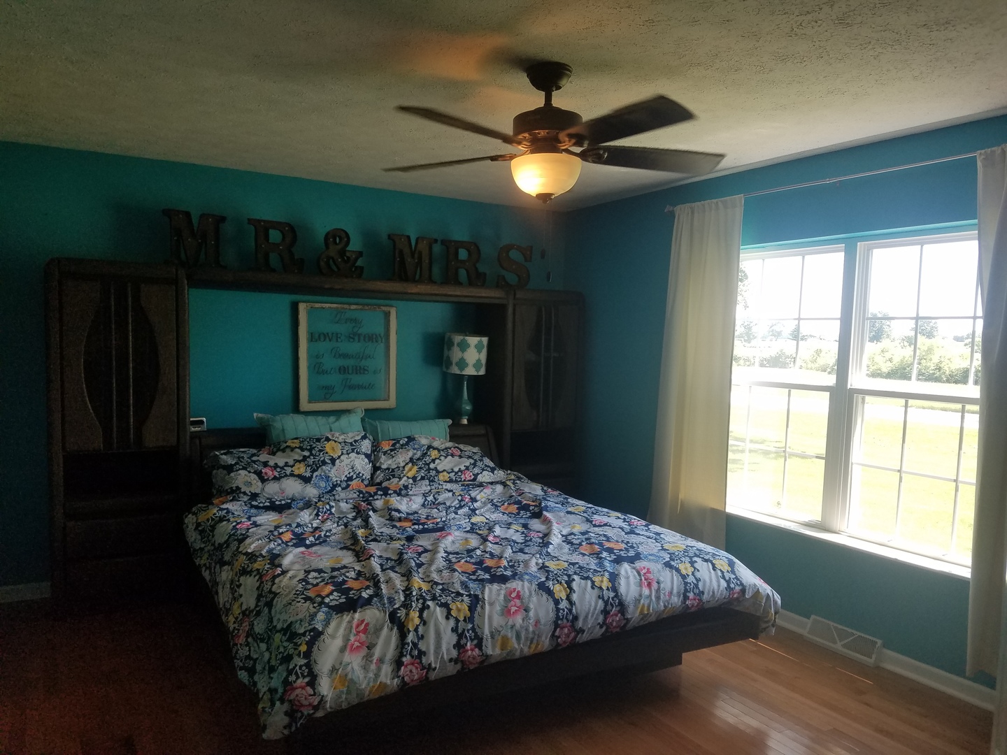25814 Mary Road Garden Prairie, IL 61038 - Photo 6 of 19 a bed sitting in a room next to a window