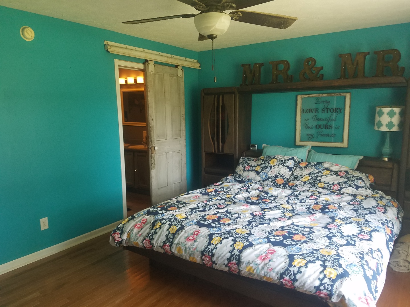 25814 Mary Road Garden Prairie, IL 61038 - Photo 7 of 19 a bed sitting in a bedroom next to a window and a chandelier