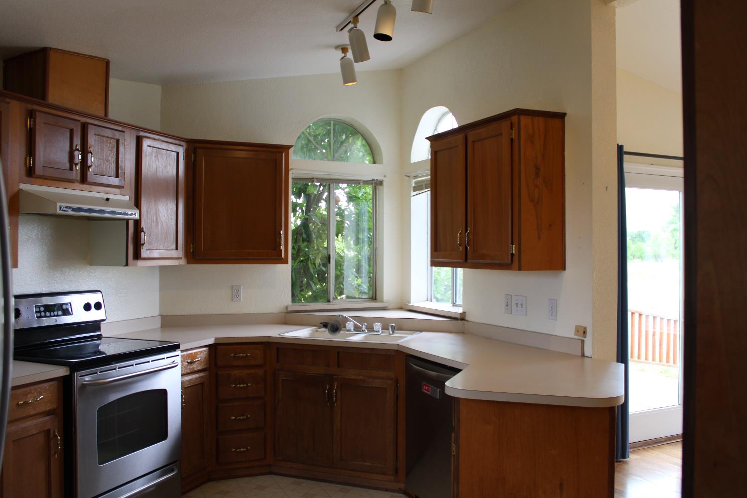 12245 Hobday Road Wilton, CA 95693 - Photo 13 of 20 Kitchen with the dining/family room to the right