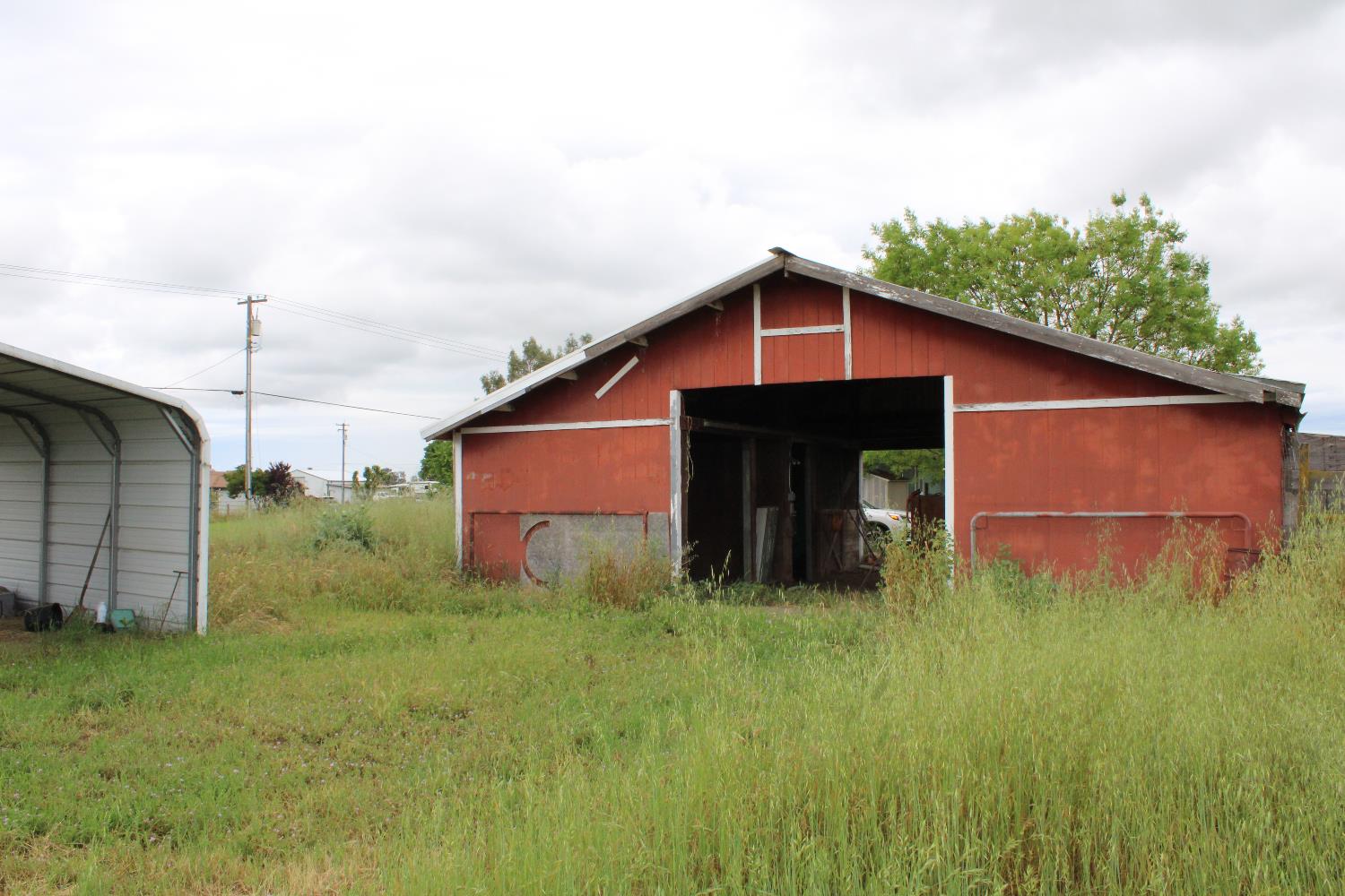 12245 Hobday Road Wilton, CA 95693 - Photo 16 of 16 Barn with stall, and rooms for tack, hay, or storage