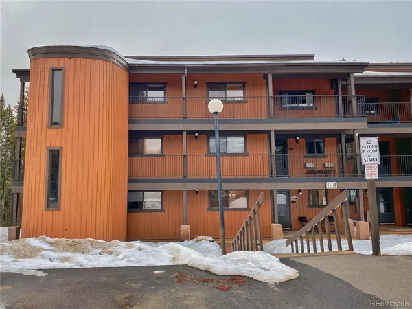 a front view of building with a street