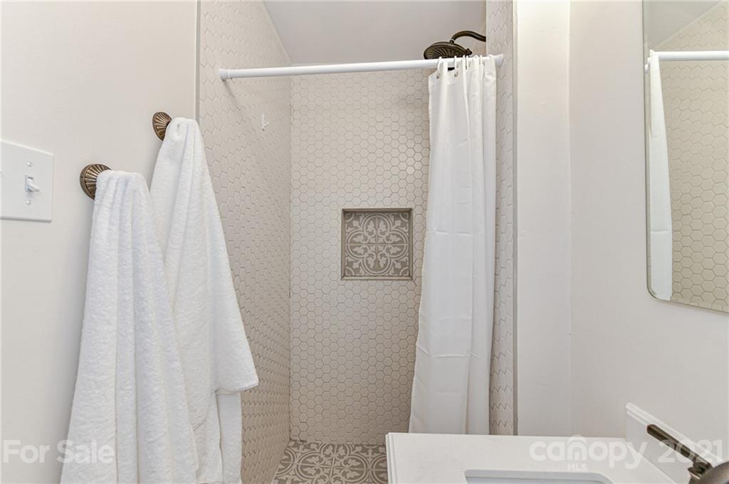5662 Pagemont Road Kannapolis, NC 28081 - Photo 14 of 27 a bathroom with a shower and a toilet