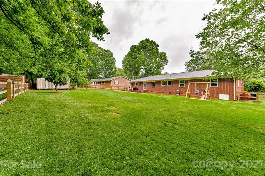 5662 Pagemont Road Kannapolis, NC 28081 - Photo 24 of 27 a front view of a house with a yard