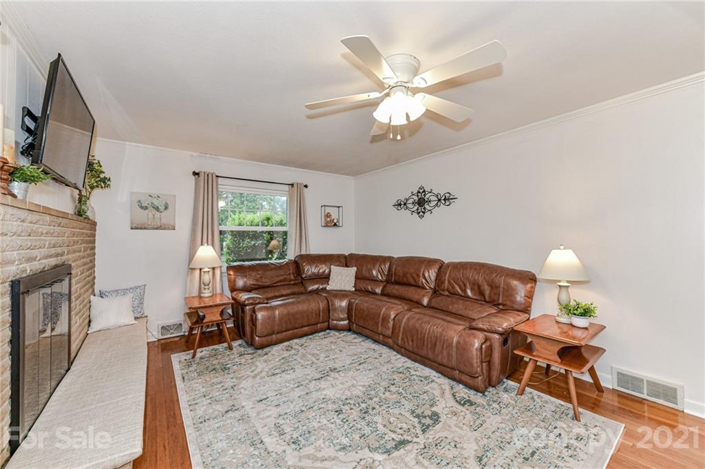 5662 Pagemont Road Kannapolis, NC 28081 - Photo 4 of 27 a living room with furniture and a fireplace
