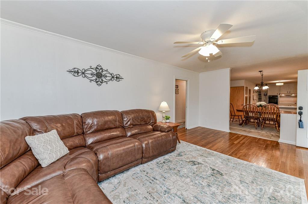 5662 Pagemont Road Kannapolis, NC 28081 - Photo 5 of 27 a living room with furniture and wooden floor