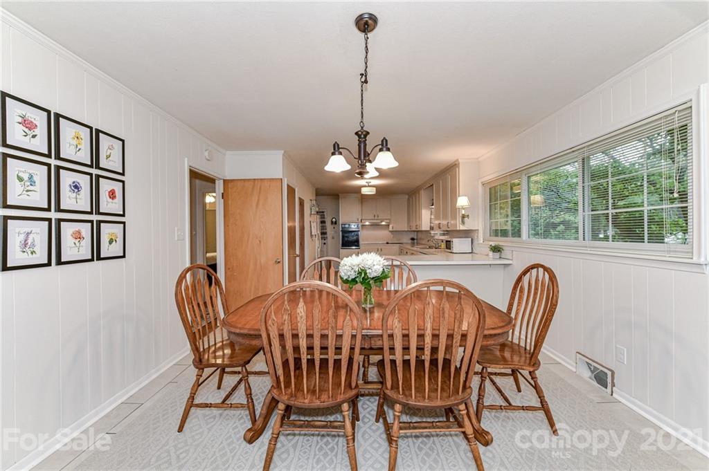 5662 Pagemont Road Kannapolis, NC 28081 - Photo 6 of 27 a view of a dining room with furniture window and outside view