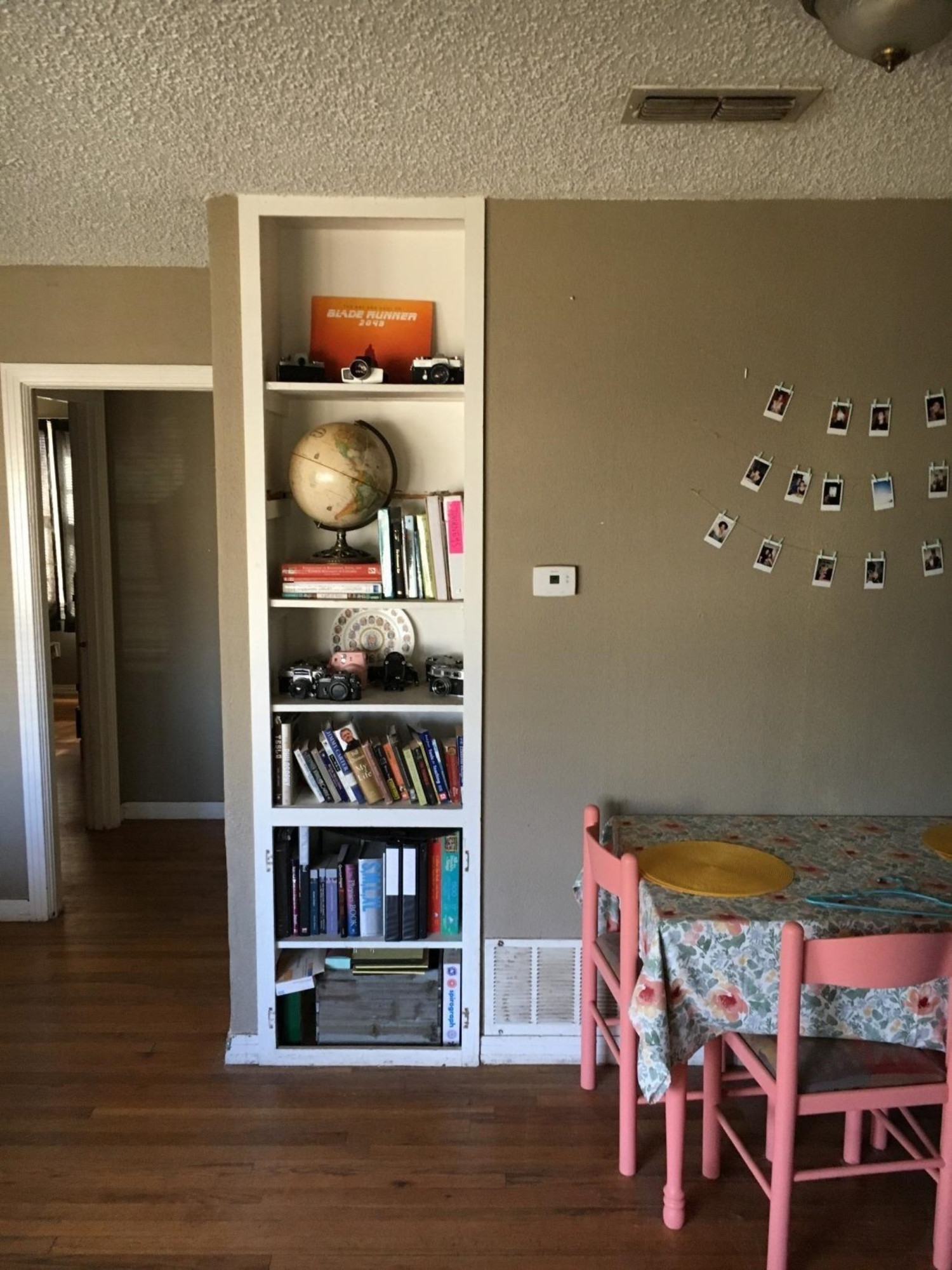 2617 37th Street Lubbock, TX 79413 - Photo 4 of 10 a workspace with furniture and wooden floor