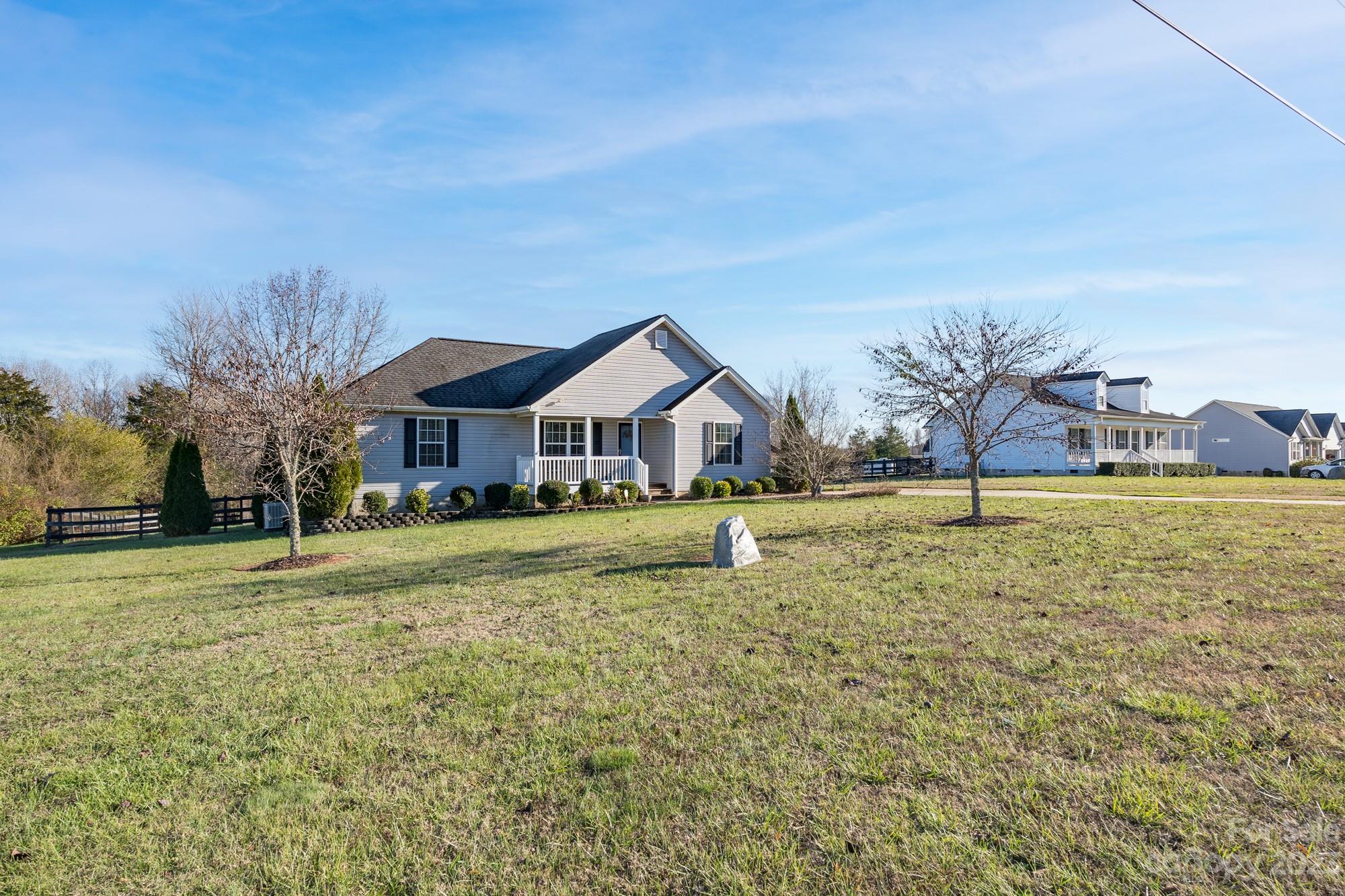 257 Springlake Road York, SC 29745 - Photo 19 of 28 a front view of house with yard and green space