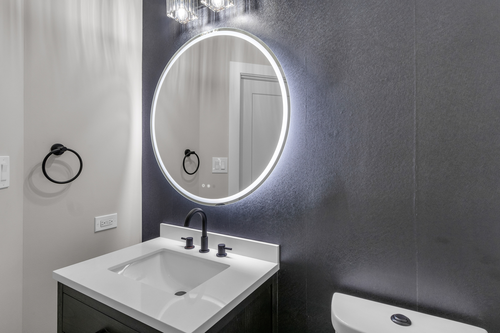 25653 Bridle Path Channahon, IL 60410 - Photo 14 of 43 a bathroom with a toilet sink vanity and mirror