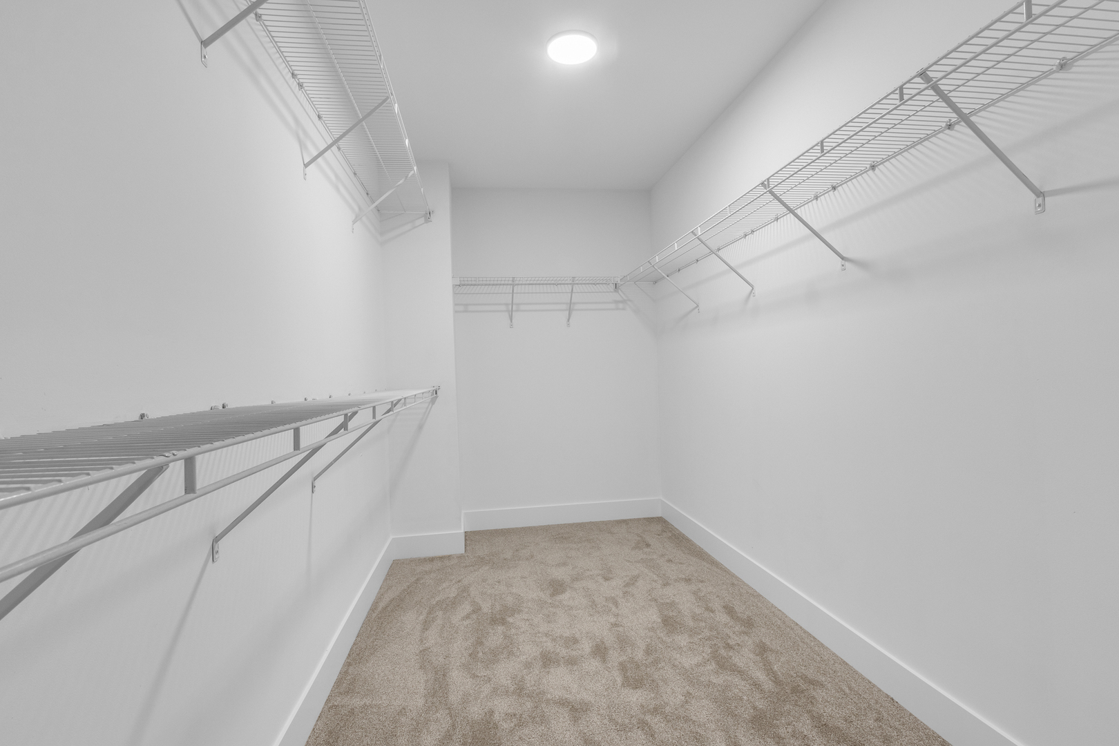 25653 Bridle Path Channahon, IL 60410 - Photo 17 of 43 a view of a room with racks on the wall