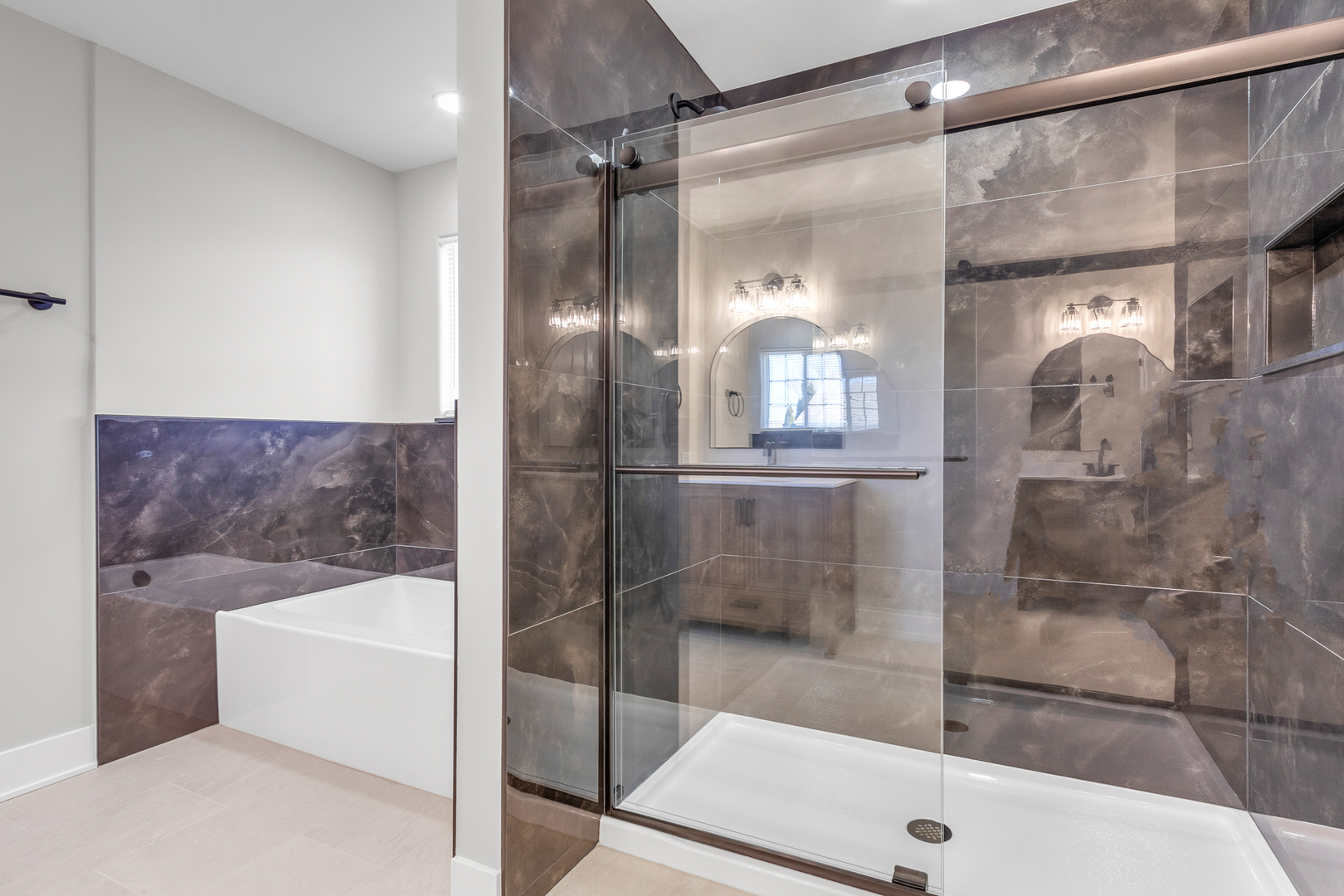 25653 Bridle Path Channahon, IL 60410 - Photo 19 of 43 a bathroom with a glass shower door