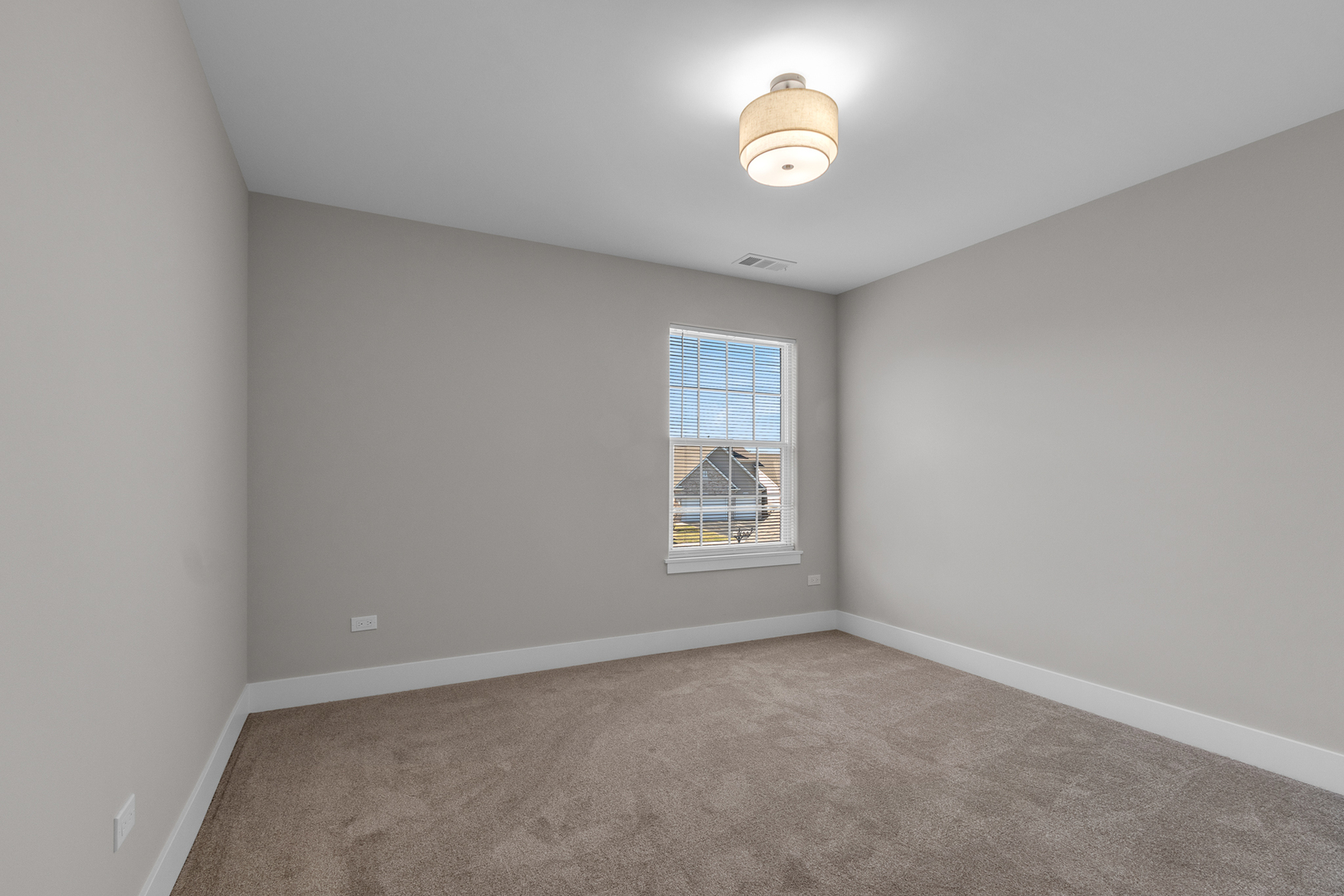 25653 Bridle Path Channahon, IL 60410 - Photo 22 of 43 an empty room with a stove and a window