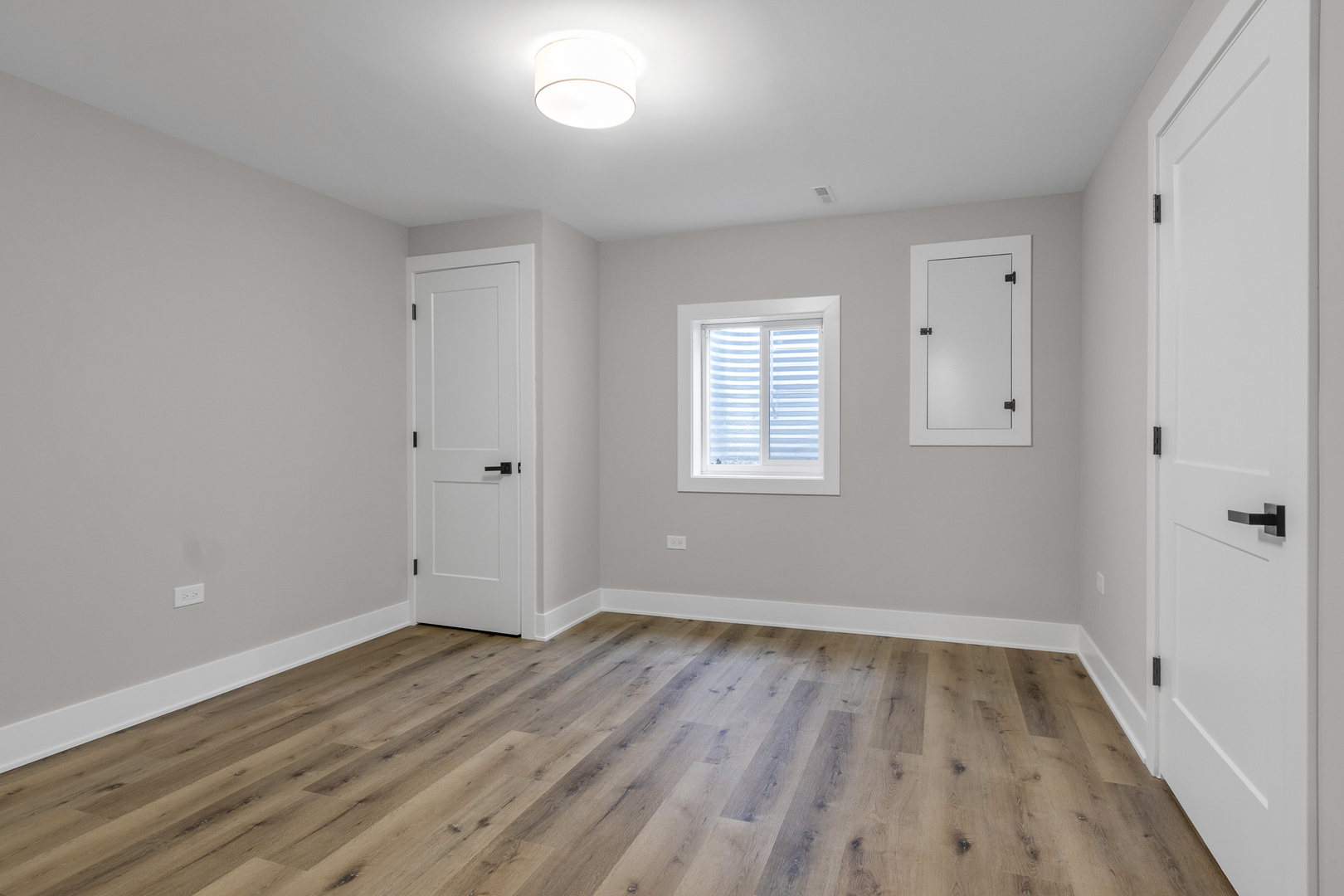 25653 Bridle Path Channahon, IL 60410 - Photo 27 of 43 wooden floor in an empty room with a window