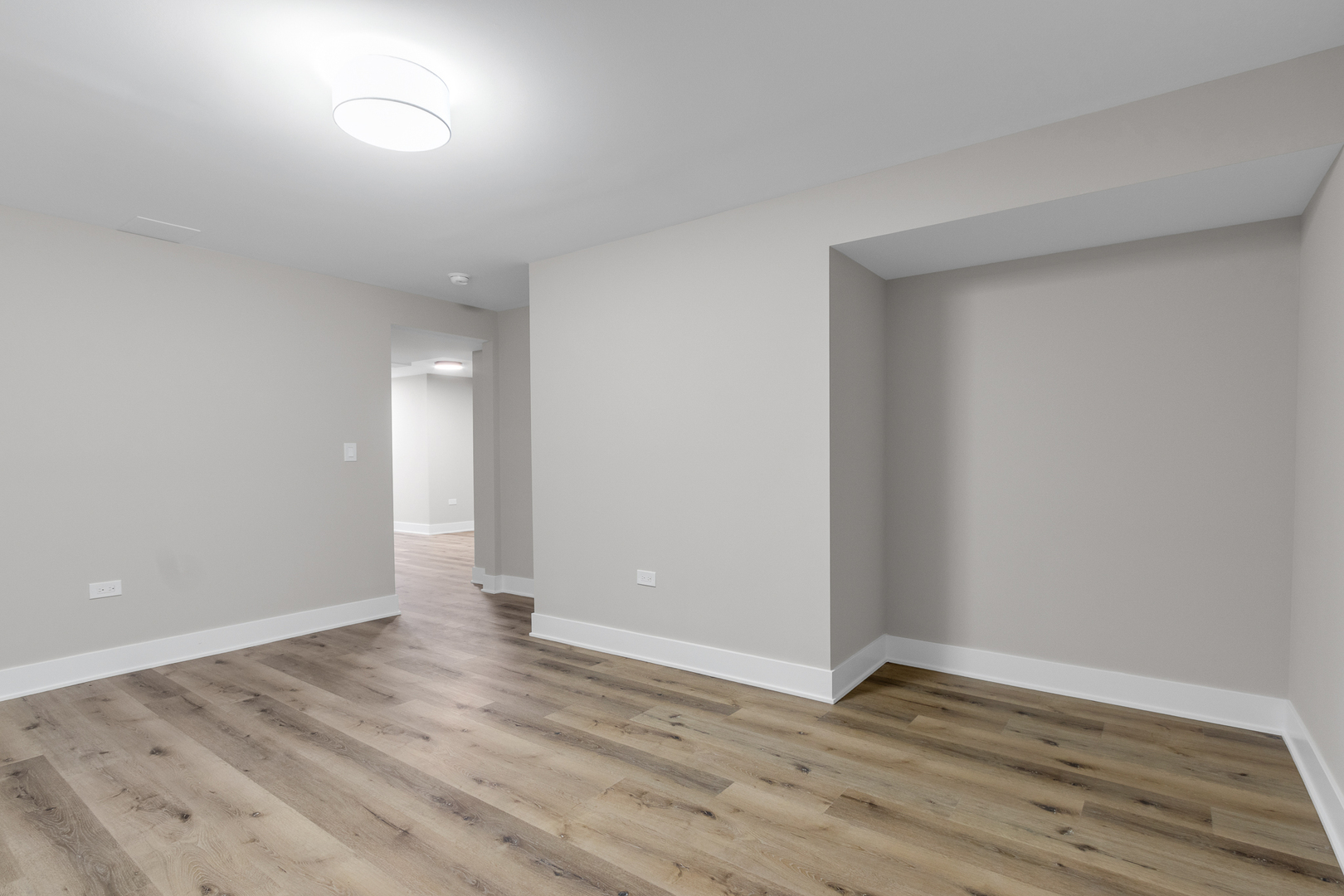 25653 Bridle Path Channahon, IL 60410 - Photo 29 of 43 a view of an empty room with wooden floor