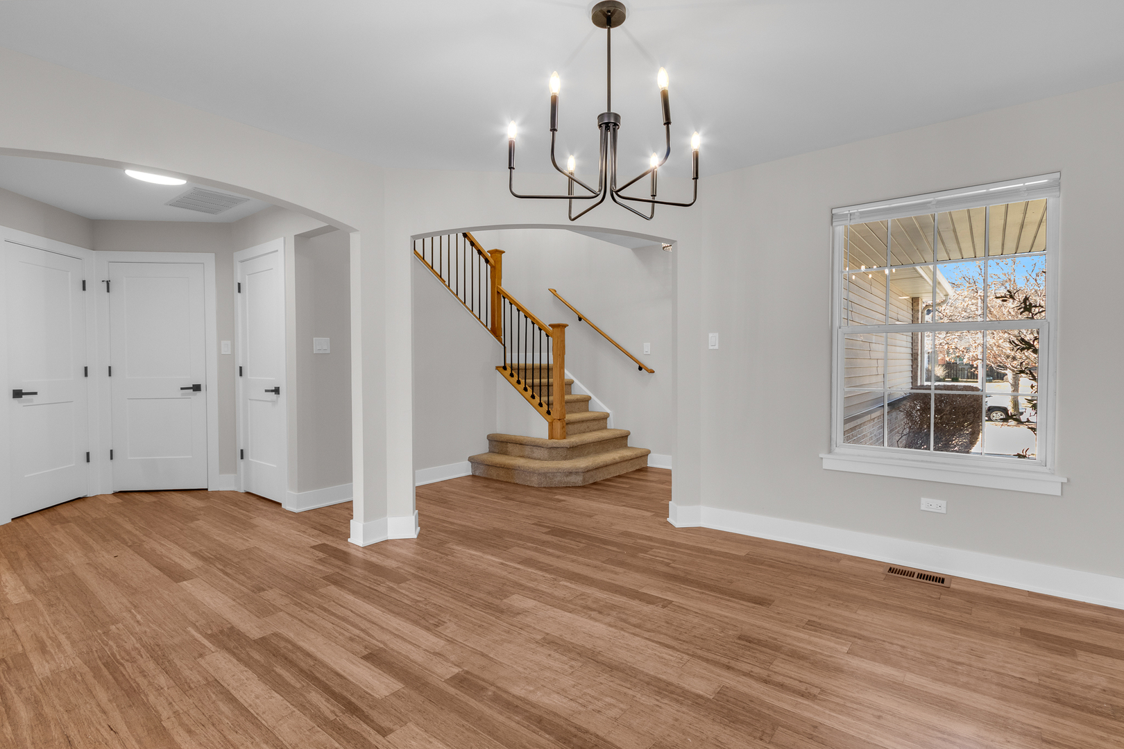 25653 Bridle Path Channahon, IL 60410 - Photo 8 of 43 a view of entryway and hall with wooden floor