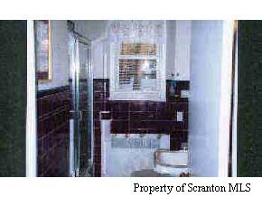 4242 Rt 307 Moscow, PA 18444 - Photo 5 of 5 a bathroom with a shower and a sink