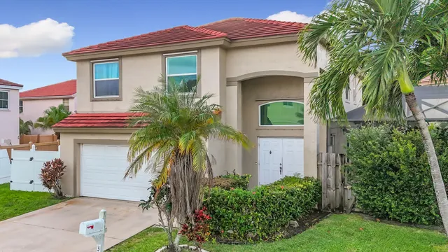 a view of a room with wooden floor and window