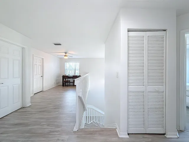 a view of house with backyard and entertaining space