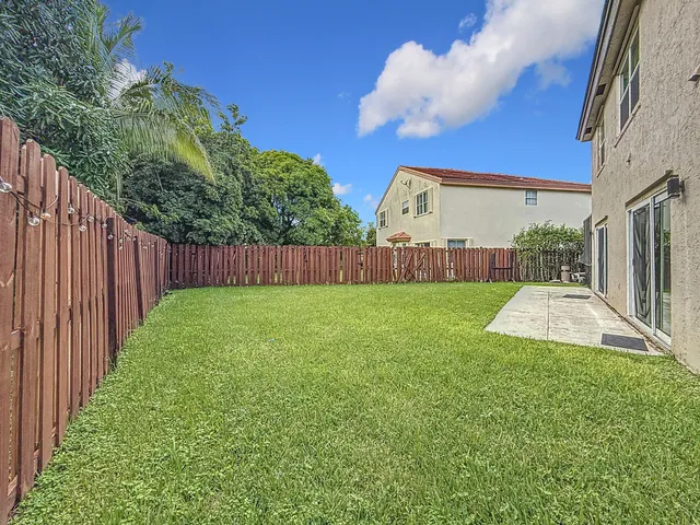 a view of outdoor space with swimming pool